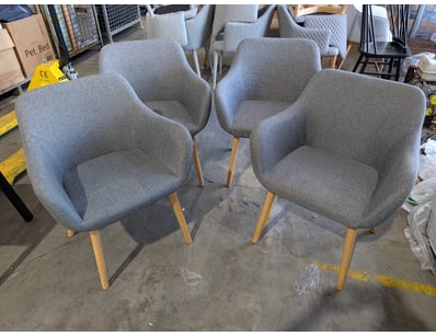 Set of four modern accent armchairs featuring curv...