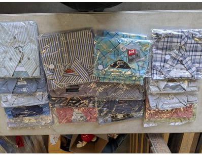 Extensive collection of men's dress shirts spannin...