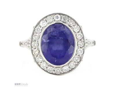 14K WHITE GOLD, TANZANITE AND DIAMOND, HALO RING. ...