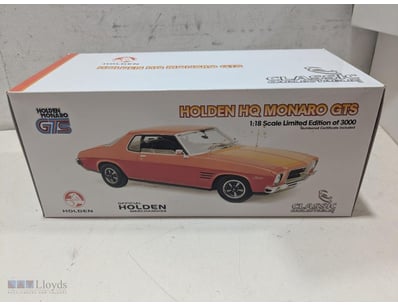 CLASSIC CARLECTABLES 1:18 SCALE DIECAST MODEL OF A...