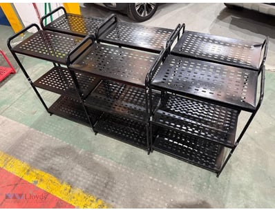 Industrial-grade black metal utility shelving unit...
