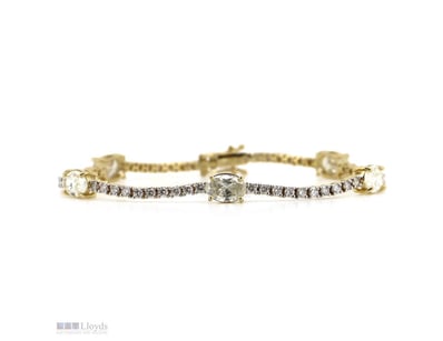 14K YELLOW GOLD, 6.91CT TDW DIAMOND, LINE BRACELET...