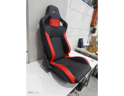 GT Omega racing seat in black and red colour schem...