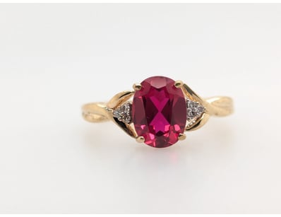 9CT YELLOW GOLD RUBY AND DIAMOND RING


583010+...