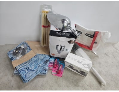 Assorted consumer goods, including table clothes, ...