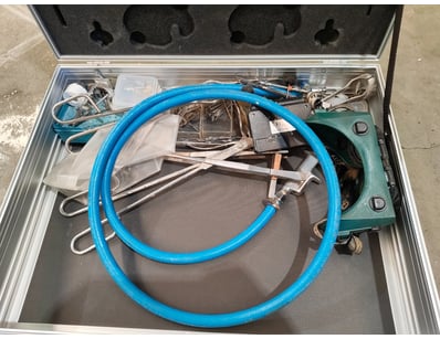 Professional airbrush kit housed in a sturdy alumi...