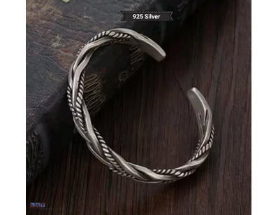 925 SILVER UNISEX TWIST DESIGN BANGLE        

Con...