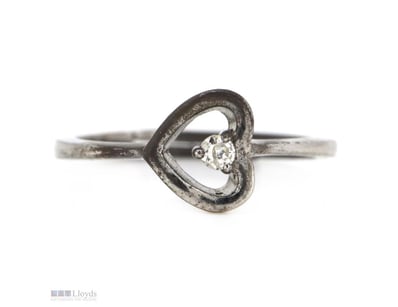 STERLING SILVER, HEART DIAMOND RING.      

The Ce...