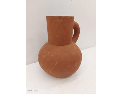 Terracotta ceramic pitcher featuring a globular bo...