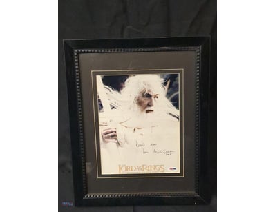 THIS FRAMED COLLECTIBLE FEATURES AN AUTOGRAPHED PH...