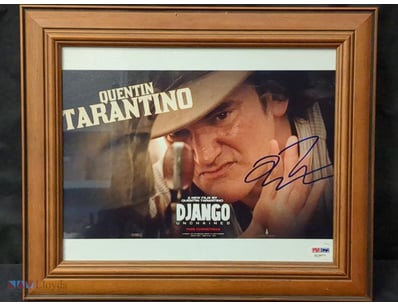 A SIGNED PROMOTIONAL PHOTOGRAPH OF DIRECTOR QUENTI...