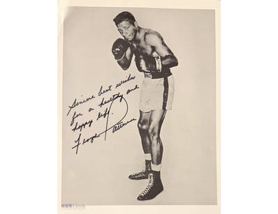 FLOYD PATTERSON SIGNED VINTAGE BOXING PHOTO

Floyd...