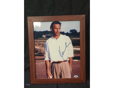 A FRAMED, AUTOGRAPHED PHOTO OF ACTOR KEVIN COSTNER...