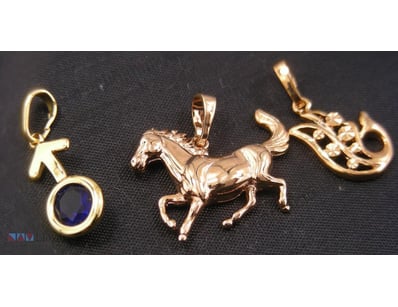 GOLD COLOUR PENDANTS        

Condition: Good - Re...