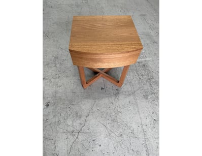 Mid-century modern bedside table crafted from soli...