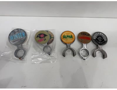 Vintage beer tap handles collection featuring 5 ic...