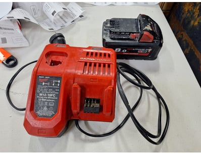 Milwaukee Battery Charger With M18 Battery

