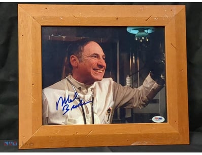 THIS IMAGE FEATURES A FRAMED, AUTOGRAPHED PHOTOGRA...
