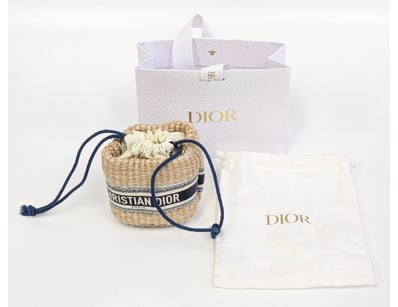 CHRISTIAN DIOR WOVEN STRAW BUCKET BAG WITH NAVY DR...