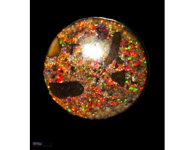 9.4 CARATS ROUND CUT BLACK MATRIX OPAL. WELL COLOU...