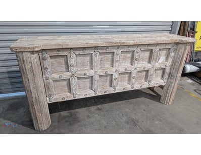 Rustic whitewashed timber sideboard featuring a di...
