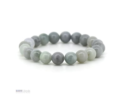NATURAL BURMESE JADE BEAD BRACELET.      

The Bra...