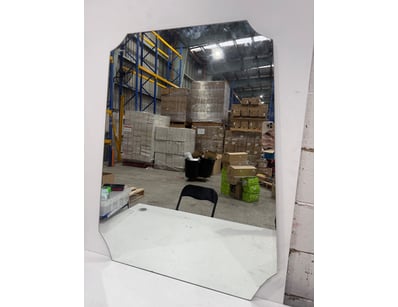Modern frameless mirror with beveled edges and cur...