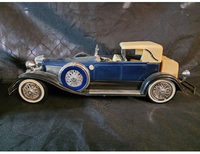 1934 ROADSTER DIE-CAST MODEL CAR DECANTER

Item Si...