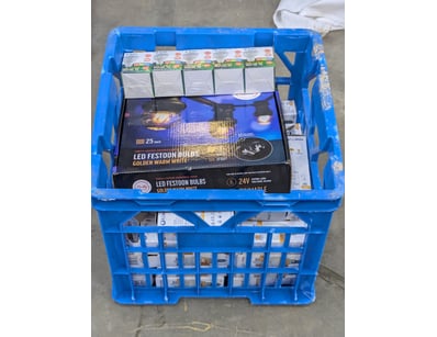 Bulk lot of LED lighting products in blue plastic ...
