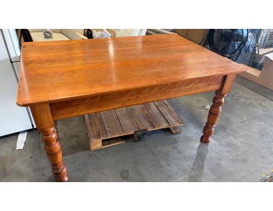 Brown wood style finish table with one drawer.

Di...