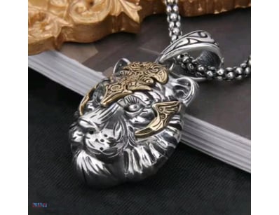 STAINLESS STEEL SILVER AND GOLD LIONS HEAD PENDANT...