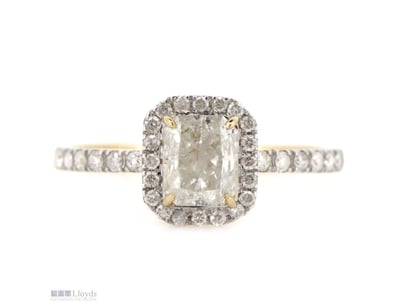 14K YELLOW GOLD AND DIAMOND, HALO RING.      

The...