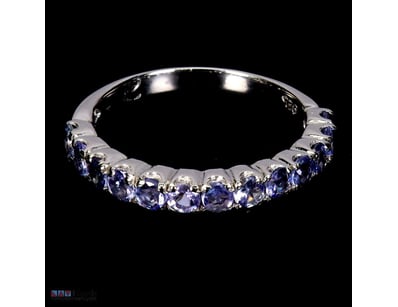 NATURAL TANZANITE ETERNITY BAND RING.     

Natura...