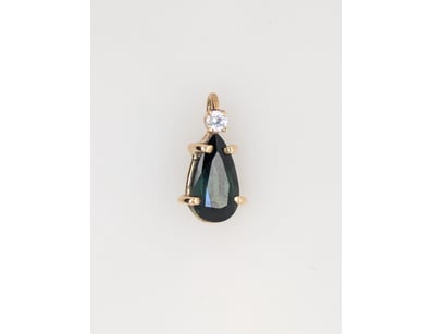 9CT, CZ AND TOURMALINE PENDANT


583010+216

...