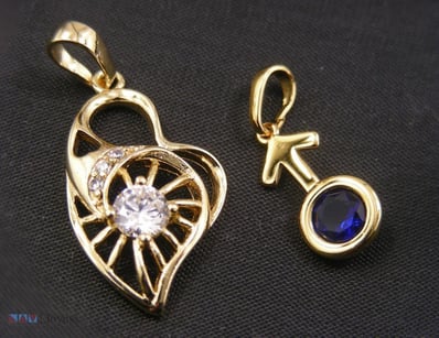 GOLD COLOUR PENDANTS        

Condition: Good - Re...