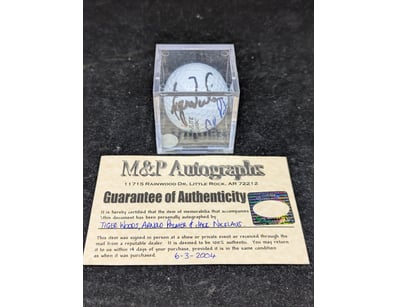 GOLF BALL SIGNED BY TIGER WOOD, ARNOLD PALMER & JA...