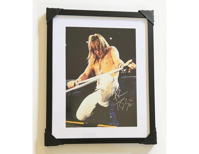 GUNS N ROSES AXL ROSE SIGNED FRAMED PHOTO 

A Blac...