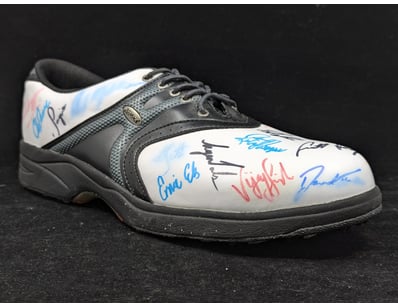 SIGNED GOLF SHOE WITH VARIOUS PLAYER SIGNATURES
...