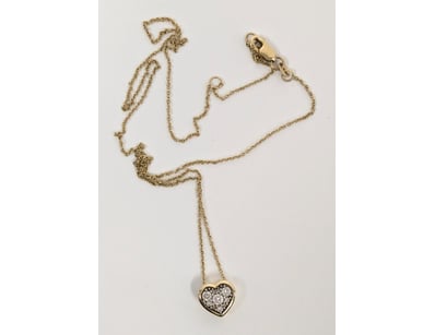 14K gold heart pendant necklace featuring lab-crea...