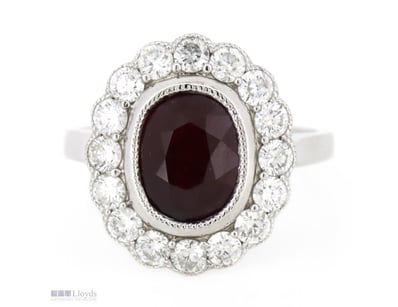 14K WHITE GOLD, RUBY AND DIAMOND, HALO RING.      ...