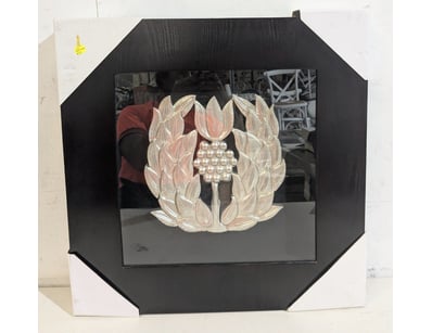 Striking octagonal display case featuring a decora...