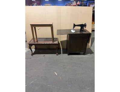 Vintage sewing machine collection featuring a clas...