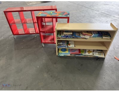 Assorted shelving units, including a four-cube red...