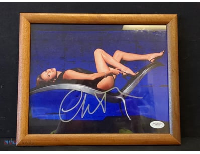 AUTOGRAPHED PHOTOGRAPH OF CHARLIZE THERON.

Item S...