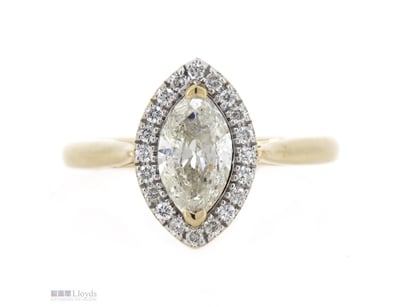 14K YELLOW GOLD AND DIAMOND, HALO RING.      

The...