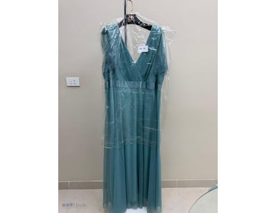 SLATE BLUE TULLE EVENING GOWN WITH FLUTTER SLEEVES...