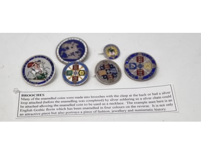 COLLECTION OF ENGLISH GOTHIC ENAMELLED SILVER BROO...