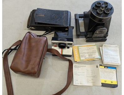 COLLECTION OF FILM AND POLAROID CAMERAS

Compreh...