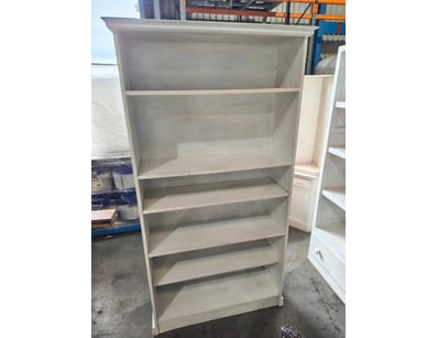 Timber bookcase featuring four fixed and one adjus...