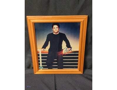 AUTOGRAPHED PHOTOGRAPH OF ROB LOWE.

Item Size: He...